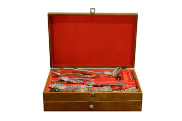 wooden box with vintage cutlery isolated on white background
