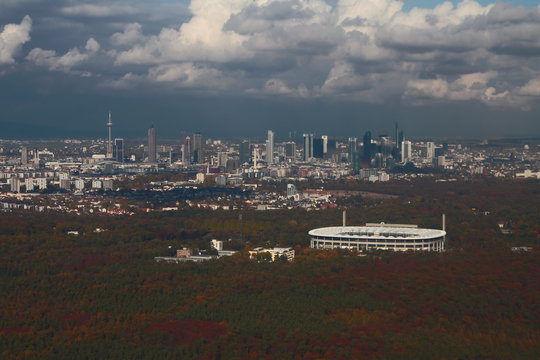 Forest area, stadium and city, aerial photograph. Frankfurt am Main, Germany