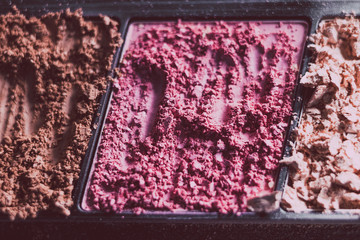 crushed blush and bronzer powders close-up shot