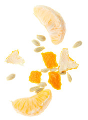 Seeds and peel in tangerines on a white background