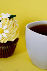 cup of coffee and cake on white background