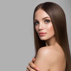Fototapeta premium Beauty Woman face Portrait. Beautiful model Girl with Perfect Fresh Clean Skin