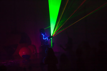 Colorful lights show. Laser show in motion in dark