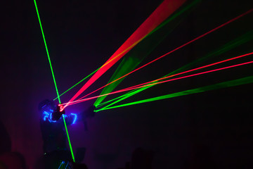 Colorful lights show. Laser show in motion in dark