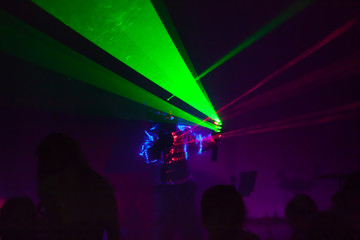 Colorful lights show. Laser show in motion in dark