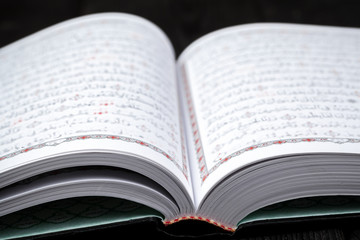 Koran  holy book of Muslims, public item of all muslims on the table , still life