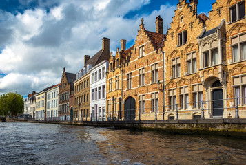 Beautiful canal and traditional houses in the old town of Bruges (Brugge), Belgium