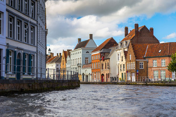 Beautiful canal and traditional houses in the old town of Bruges (Brugge), Belgium