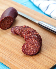 Turkish Sausage Sucuk on the wooden table
