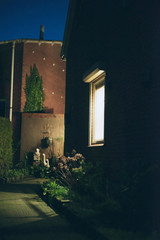 Illuminated window of house in the night.