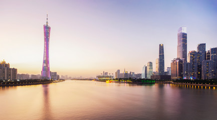 Seaside city skyline, office buildings, landmarks at sunset.GuangZhou,China