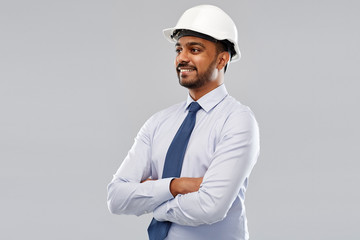 architecture, construction business and building - smiling indian architect or businessman in...
