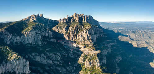 Aerial; panoramic view of famous mountain range, place of pilgrimage for many people; stone cliffs,...