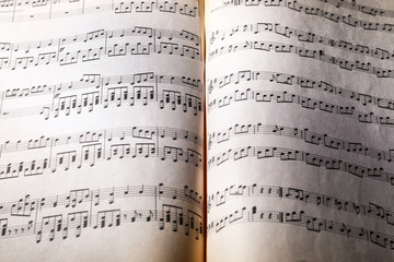 Naklejka premium Music sheets on table