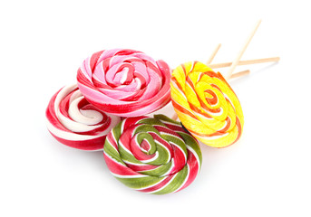 Sweet lollipops on white background