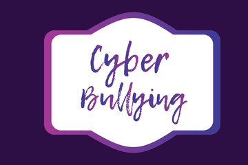 Writing text Cyber Bullying.