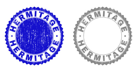 Grunge HERMITAGE stamp seals isolated on a white background. Rosette seals with grunge texture in blue and grey colors. Vector rubber watermark of HERMITAGE caption inside round rosette.