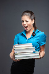 Young Woman Student architect holding books.