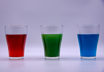 Three glasses of water in different colors. RGB