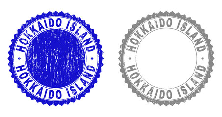 Grunge HOKKAIDO ISLAND stamp seals isolated on a white background. Rosette seals with grunge texture in blue and gray colors.