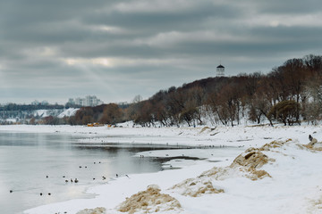 View of the Frozen River with Ravnes on the Ice During Scenic Sawn at a Winter Day in Kolomenskoye Park, Moscow