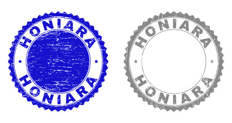 Obraz premium Grunge HONIARA stamp seals isolated on a white background. Rosette seals with grunge texture in blue and gray colors. Vector rubber stamp imprint of HONIARA title inside round rosette.
