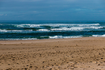 Fototapeta na wymiar The sand leading up to the ocean