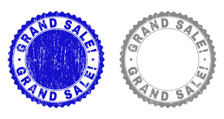 Obraz premium Grunge GRAND SALE! stamp seals isolated on a white background. Rosette seals with grunge texture in blue and grey colors. Vector rubber stamp imitation of GRAND SALE! caption inside round rosette.