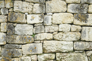 Old relief limestone wall closeup