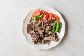 Traditional Turkish Offal Food Kelle Sogus / Lamb Head Meat with Brain Served Portion with Plate.