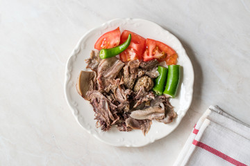 Traditional Turkish Offal Food Kelle Sogus / Lamb Head Meat with Brain Served Portion with Plate.