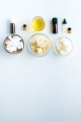 diy body butter with ingrdients on concrete background