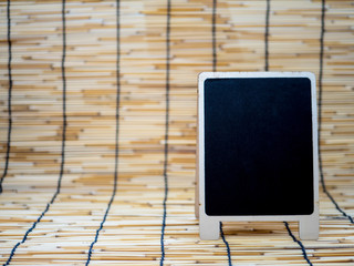 small blackboard on table .