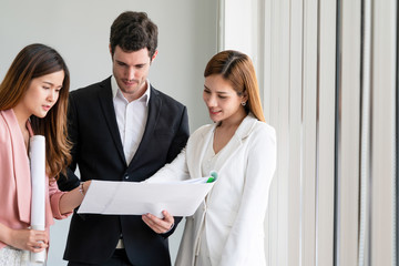 Businessman is in meeting discussion with colleague businesswomen in modern workplace office....