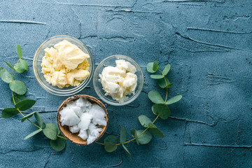 diy body butter with ingrdients on concrete background