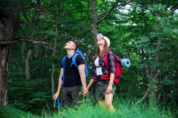 Fototapeta premium Young couple on hiking trip