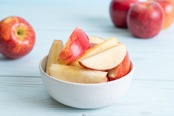Fototapeta na wymiar fresh red apples sliced bowl