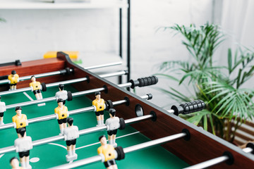 Naklejka premium selective focus of football table in living room