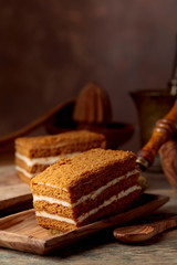 Homemade layered honey cake with cream.