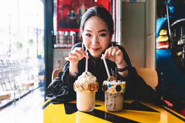 Asian woman having chocolate frappe drinks