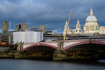 london bridge and constructions against blue sky