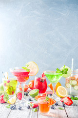 Selection summer fruit and berry cocktail drinks.  copy space