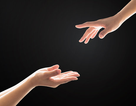 Charity donation concept with women's hand  in giving and receiving  gesture