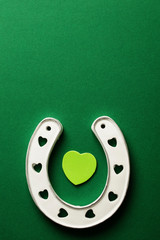 St Patrick's Day green background with lucky horseshoe