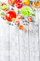 Obraz na płótnie Canvas Selection summer fruit and berry cocktail drinks. copy space