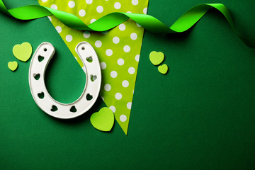 St Patrick's Day green background with lucky horseshoe