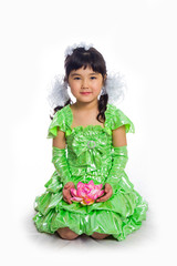 Kazakh girl of 5-6 years in a green dress, full length. Isolation on a white background