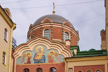 Image of a fragment of the facade of the Church of St. John the theologian with the icon of the Mother of God, St. Petersburg, Russia