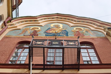 Image of a fragment of the facade of the Church of St. John the theologian with the icon of the Mother of God, St. Petersburg, Russia