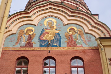 Image of a fragment of the facade of the Church of St. John the theologian with the icon of the Mother of God, St. Petersburg, Russia
